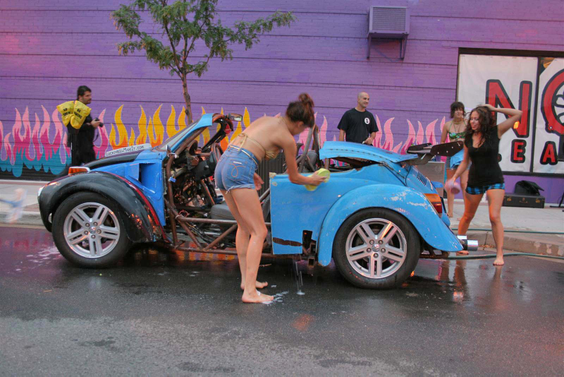 Illustration for article titled Noir Leather Bikini Car Wash Meetup Pictures